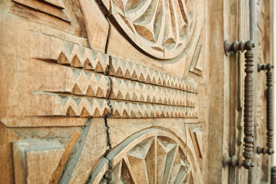 Sculpted wooden door Photograph by Vlad Baciu