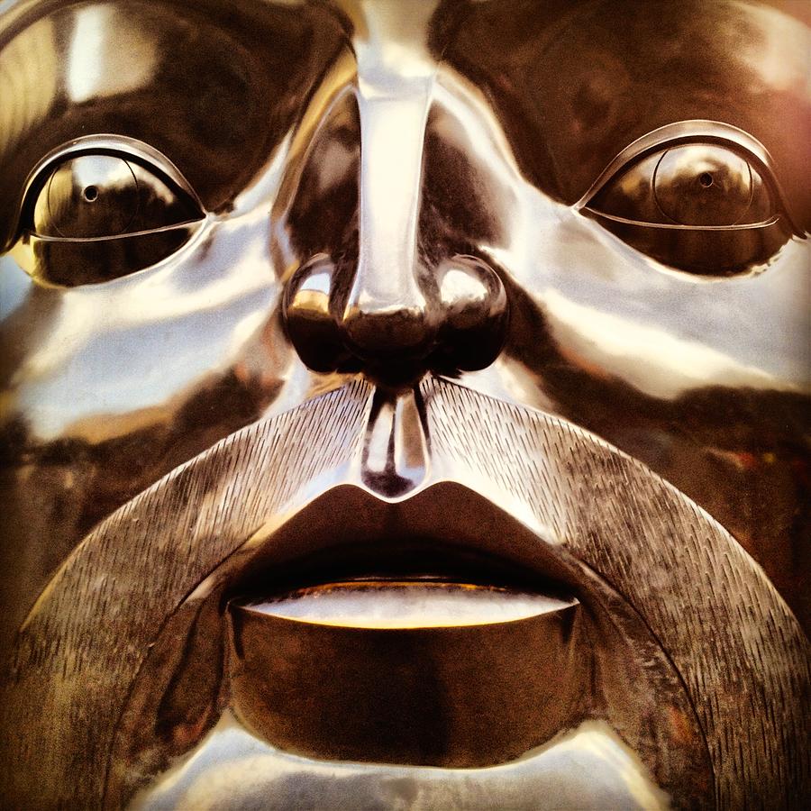 City Photograph - Sculpture detail of a face by REO De Jongh