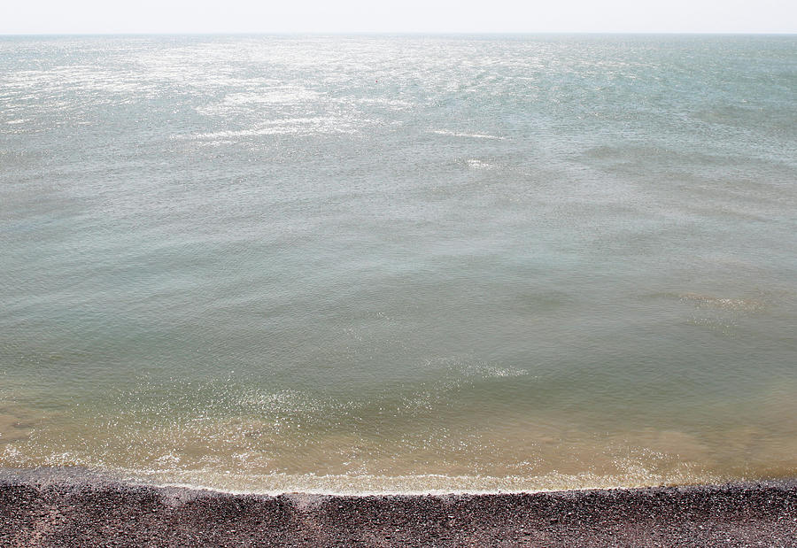 Sea And Shoreline Photograph by Richard Newstead
