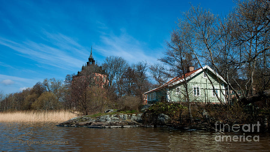 Sea cottage at Wik Castle Photograph by Torbjorn Swenelius