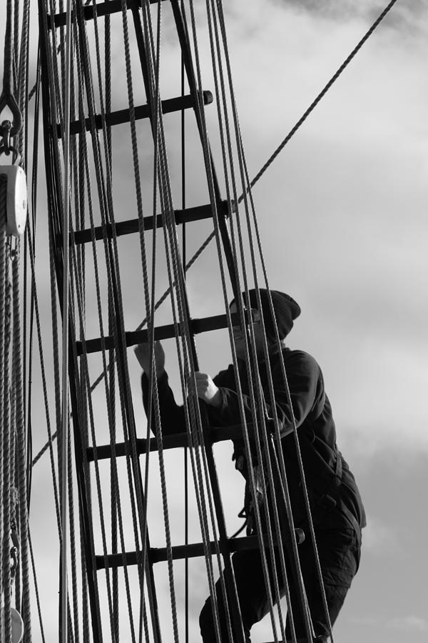 Seaman climbing in the rigging - monochrome Photograph by Ulrich Kunst And Bettina Scheidulin