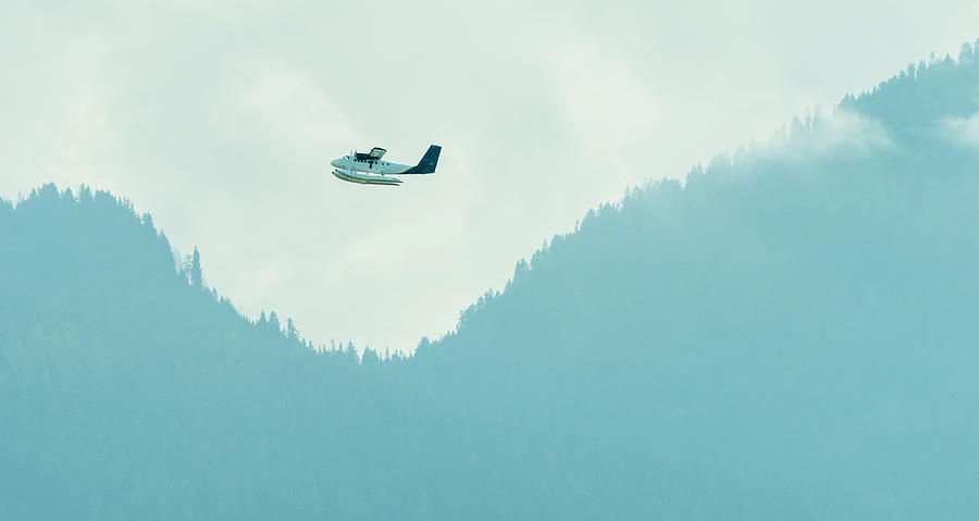 Nature Photograph - Seaplane Flying Over Forested North by Ben Girardi