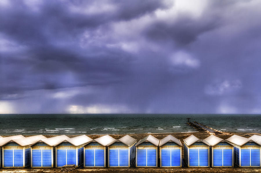 Seascape with bathing huts Photograph by Roberto Pagani