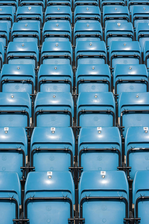 Seats In A Sports Arena Photograph by Gustoimages/science Photo Library
