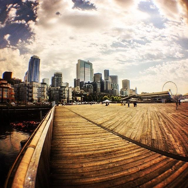 Seattle Photograph - #seattle #skyline From The #pier During by Derek Kiel