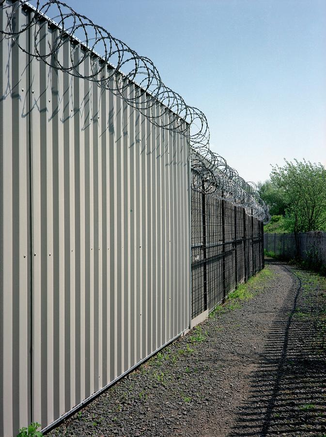 Security Fence Photograph by Robert Brook/science Photo Library