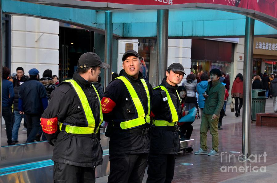 Security team at Nanjing Road Shanghai China Photograph by Imran Ahmed