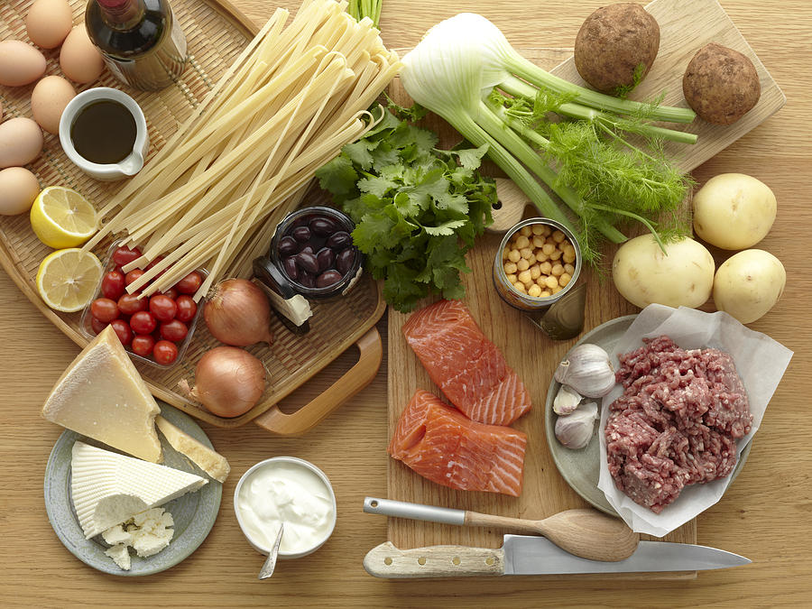 Selection of fresh raw foods with eggs, pasta, herbs, cheese, vegetables, salmon and minced pork Photograph by Brett Stevens Selection of fresh raw foods with eggs, pasta, herbs, cheese, vegetables, salmon and minced pork Photograph by Brett Stevens