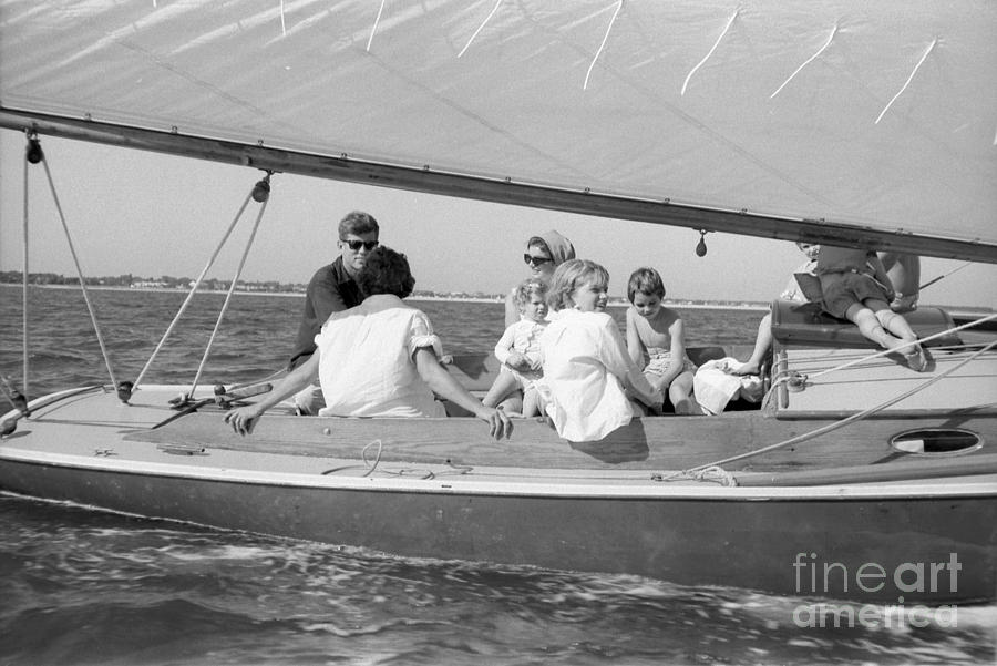 Senator John F. Kennedy Photograph - Senator John F. Kennedy with Jacqueline and Children Sailing by The Harrington Collection
