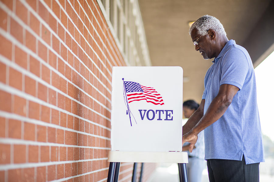 Senior Black Man Voting Photograph by Adamkaz