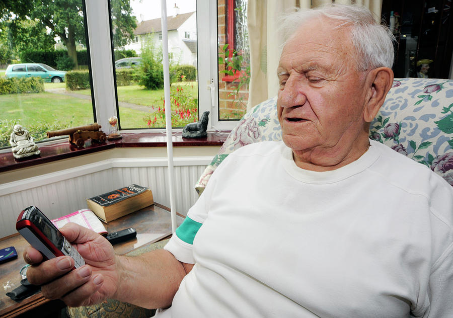 Human Photograph - Senior Man Using Mobile Phone by Public Health England