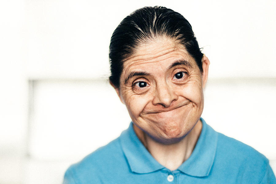 Senior Mexican woman with down syndrome Photograph by Ferrantraite