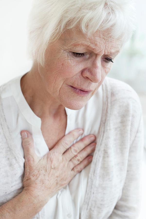 Senior Woman Touching Chest Photograph By Science Photo Library - Fine 