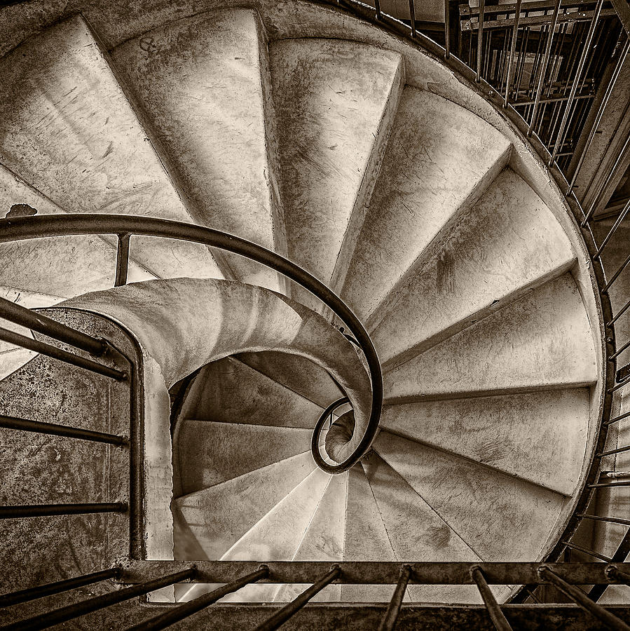 Sepia spiral staircase Photograph by Roberto Pagani