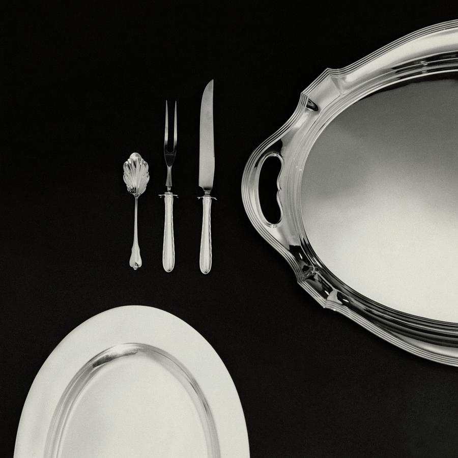 Serving Dishes And Utensils Photograph by Herbert Matter