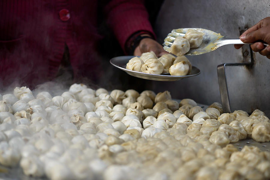 Serving nepalese momos Photograph by Dutourdumonde Photography