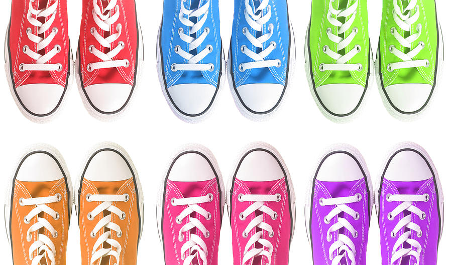 Set of six colorful sneakers over a white background Photograph by Sadeugra