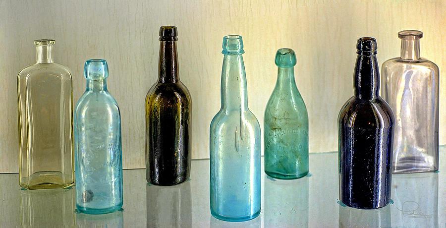 Seven Old Bottles Photograph by Ludwig Keck