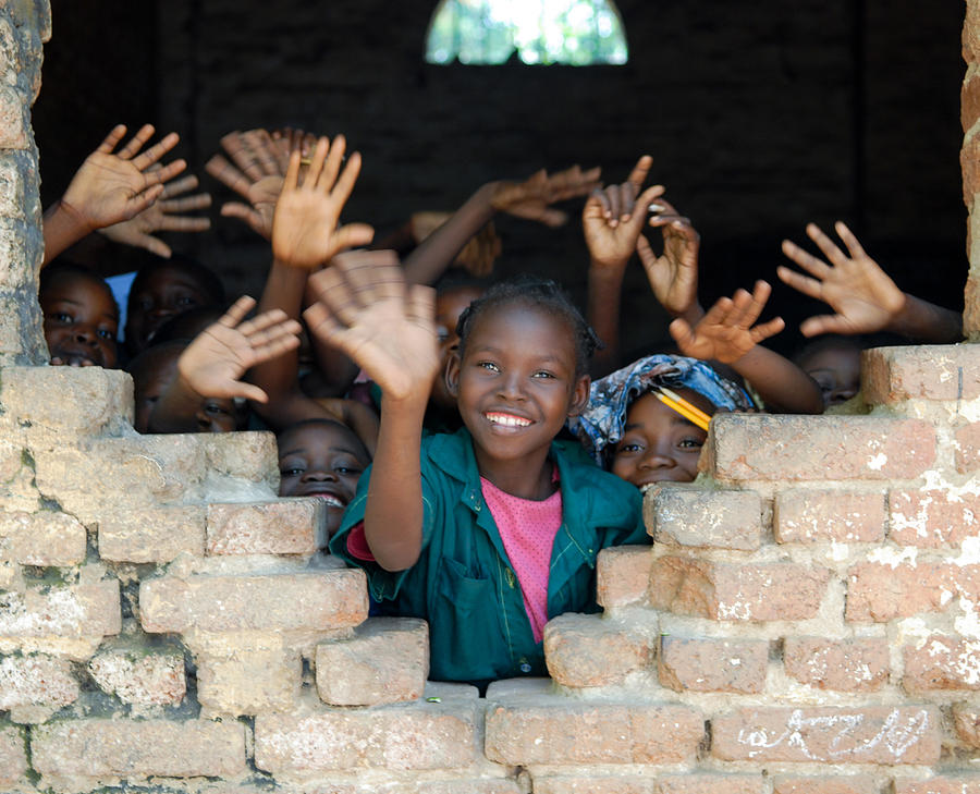 Several African children waving hands in Tchad Photograph by Yoh4nn