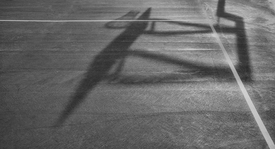 Shadow On The Basketball Court Photograph by Gary Slawsky
