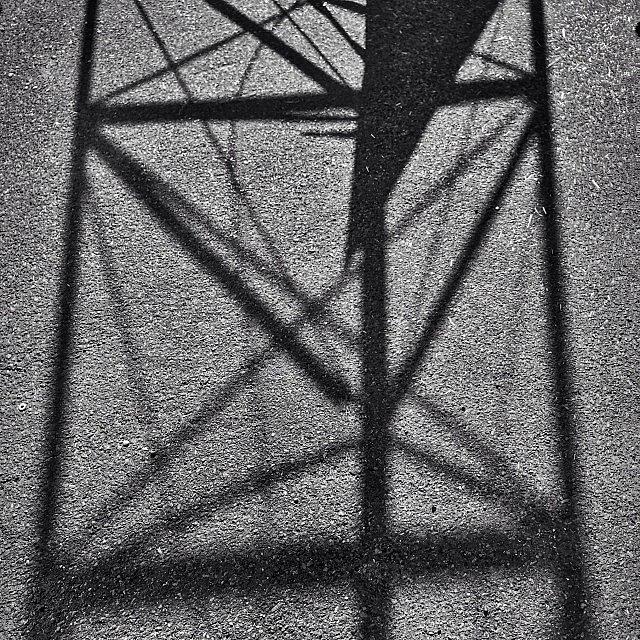 Shadows In Geometry...
--- Check Out Photograph by Mark David Gerson