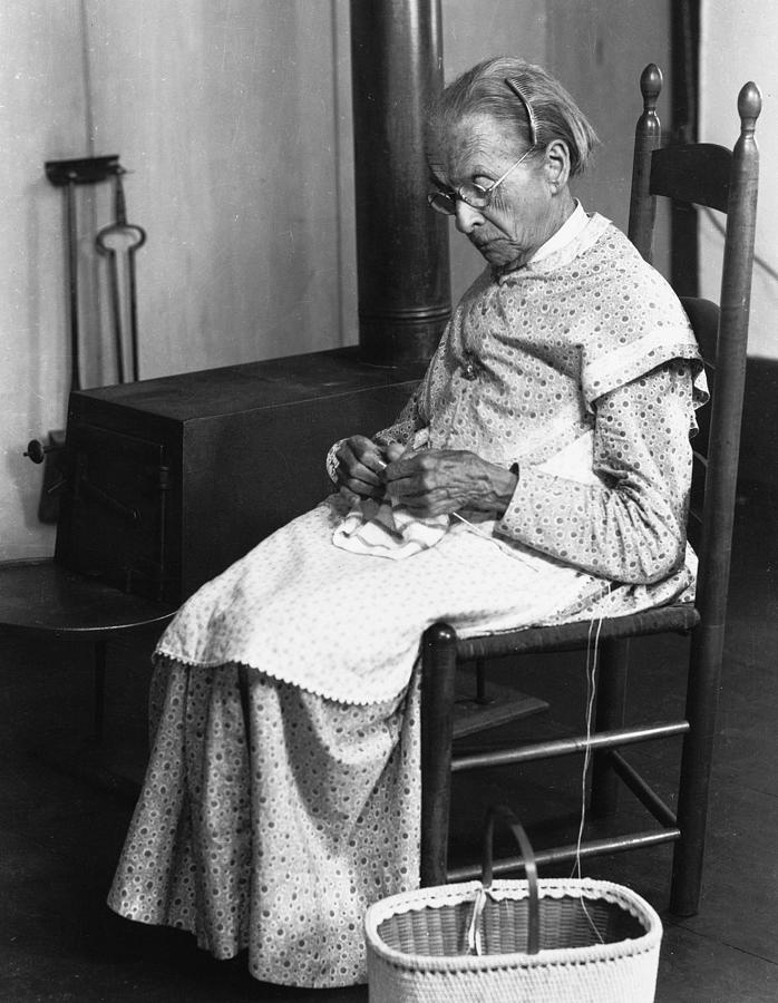 Shaker Woman Knitting Photograph by Granger