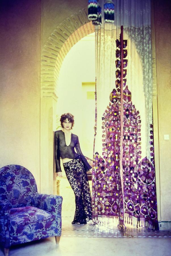 Shalom Harlow Standing Under Arch In Morocco Photograph by Arthur Elgort