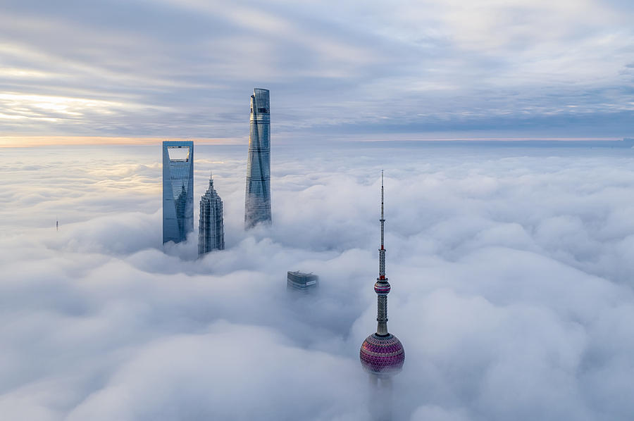 Shanghai In Clouds Photograph by Xiaodong Qiu