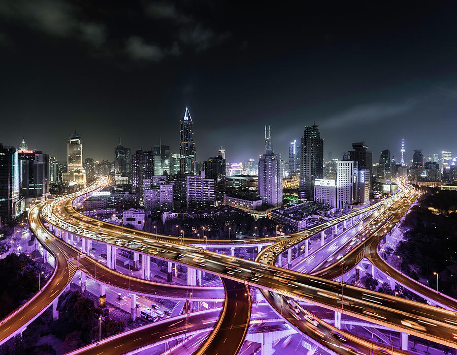Shanghai Skyline And Road Intersection Photograph by Martin Puddy
