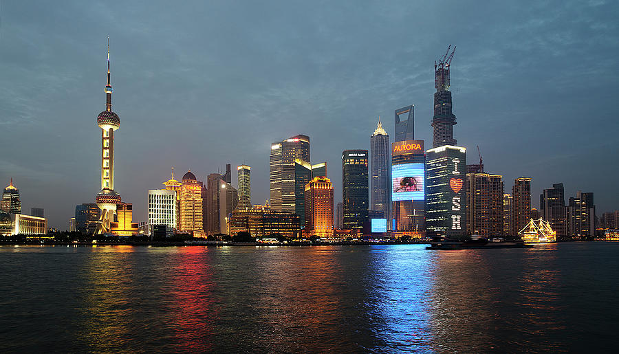 Shanghais Skyline With A Well-lit Boat Photograph by Andrew Tb Tan