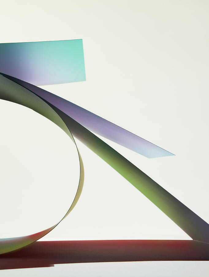 Sheets Of Paper With Colored Shadows Photograph by Paul Taylor