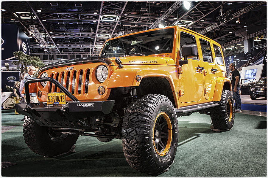 Shining Yellow Jeep Wrangler Rubicon. Photograph by Oleg Hmelnits - Pixels