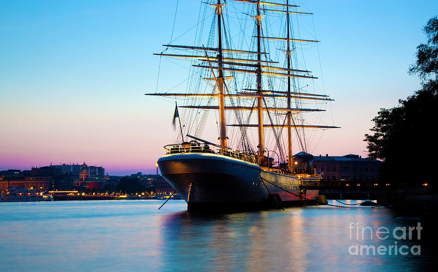 Ship at sunset in Stockholm Photograph by Michal Bednarek