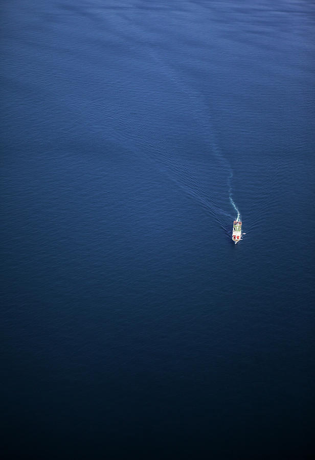 Ship In Ocean Photograph by Shan Shui