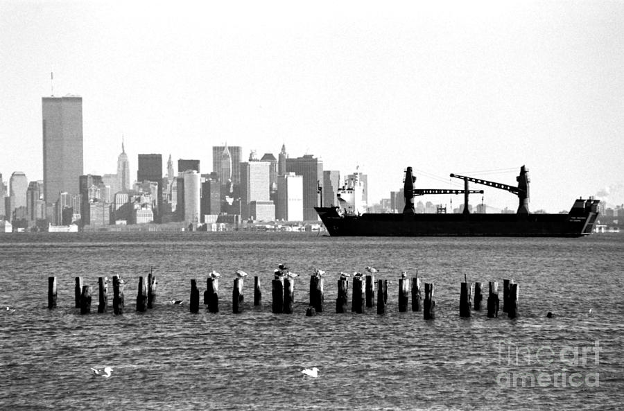 Skyscraper Photograph - Ship in the Harbor 1990s by John Rizzuto