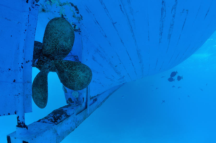 Ship propeller and hull, underwater view Photograph by Sami Sarkis
