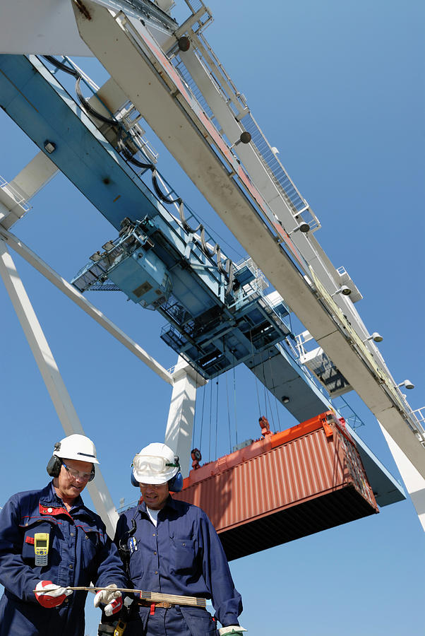 Shipping Workers With Cargo Container Photograph by Christian Lagerek/science Photo Library