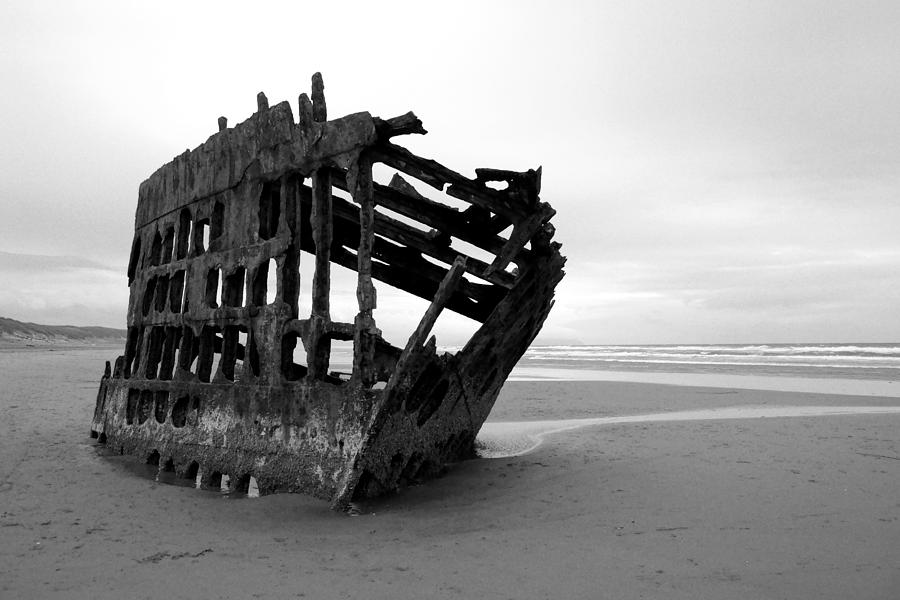 Shipwreck on the Beach Photograph by Daniel Woodrum