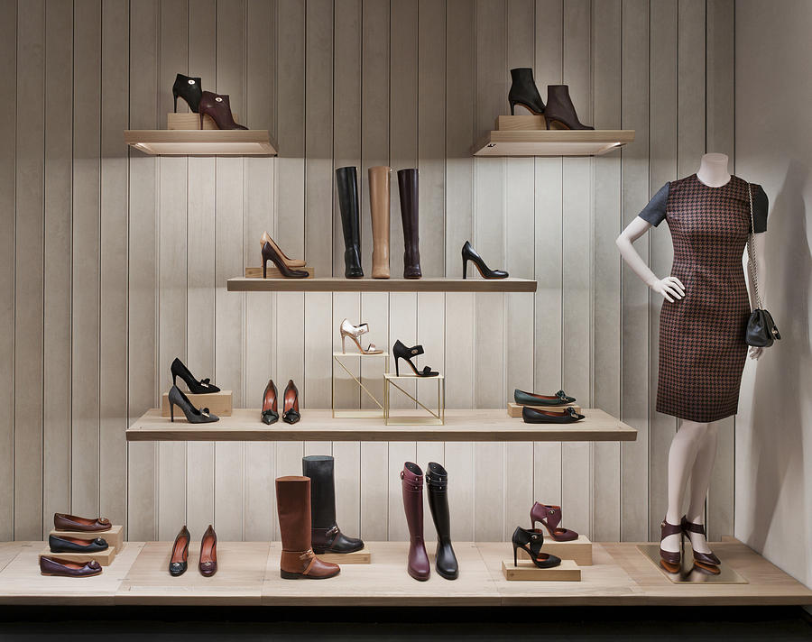 Shoe shelve in luxury boutique Photograph by Vostok