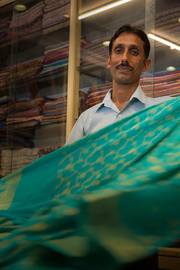 Shopkeeper - India Photograph by Matthew Onheiber