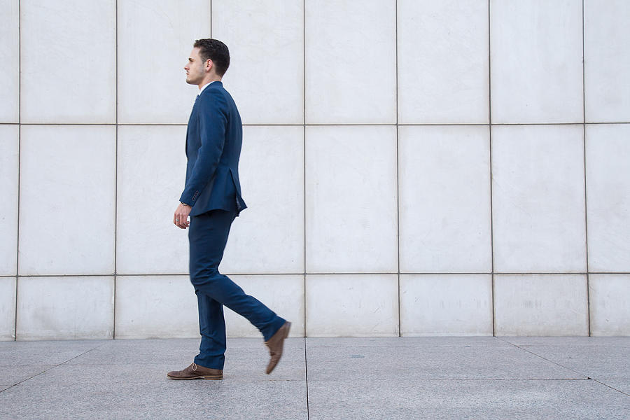 Side View Of Businessman Walking On Footpath Photograph by Pablo Benitez Lope / EyeEm Side View Of Businessman Walking On Footpath Photograph by Pablo Benitez Lope / EyeEm