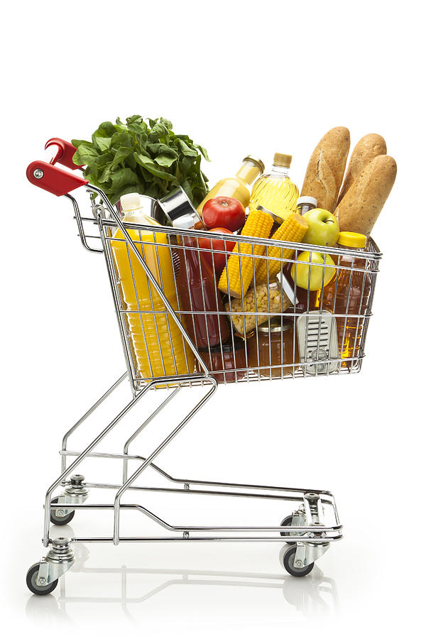Side view of shopping cart filled with groceries and vegetables Photograph by Fcafotodigital