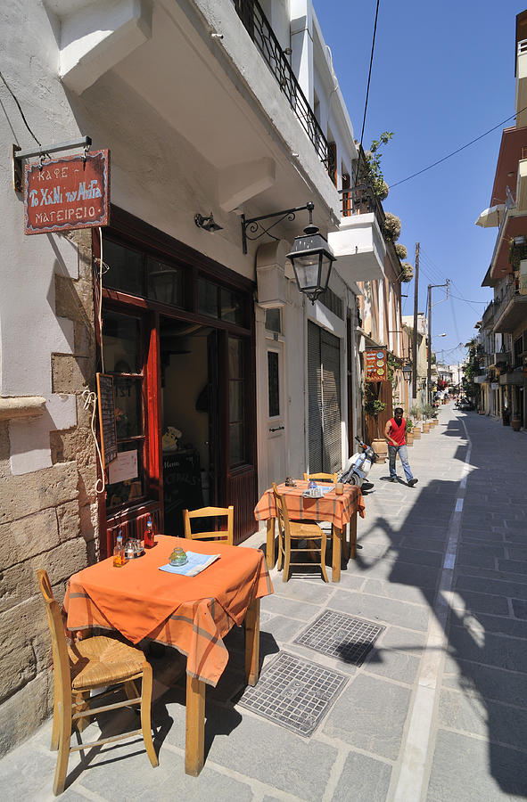 Sidewalk cafe in Greece Photograph by Matthias Hauser