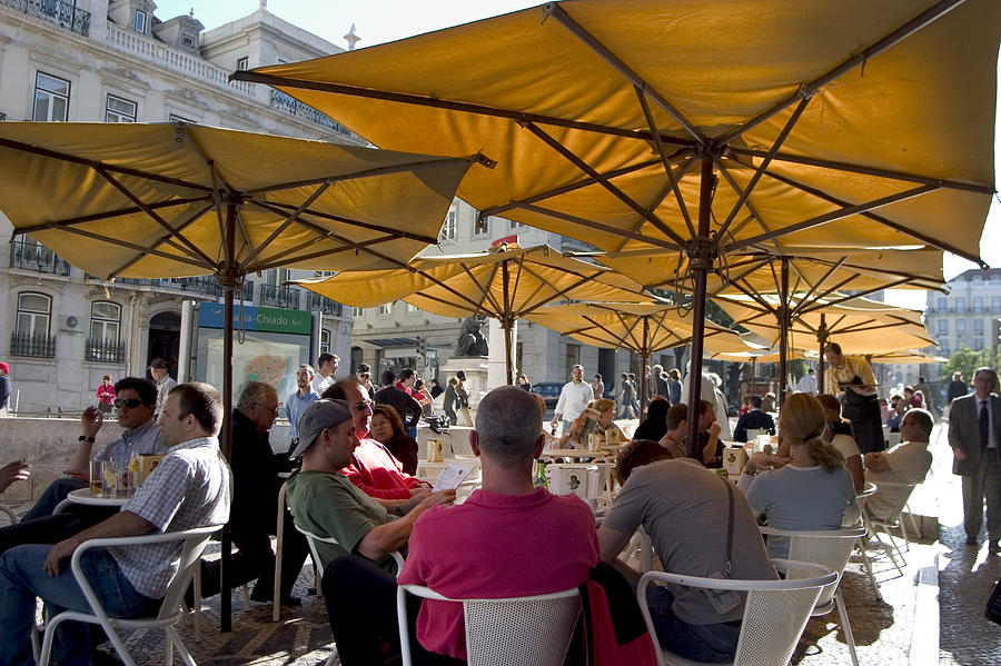 Sidewalk Cafe Photograph - Sidewalk Cafe in Lisbon by Carl Purcell