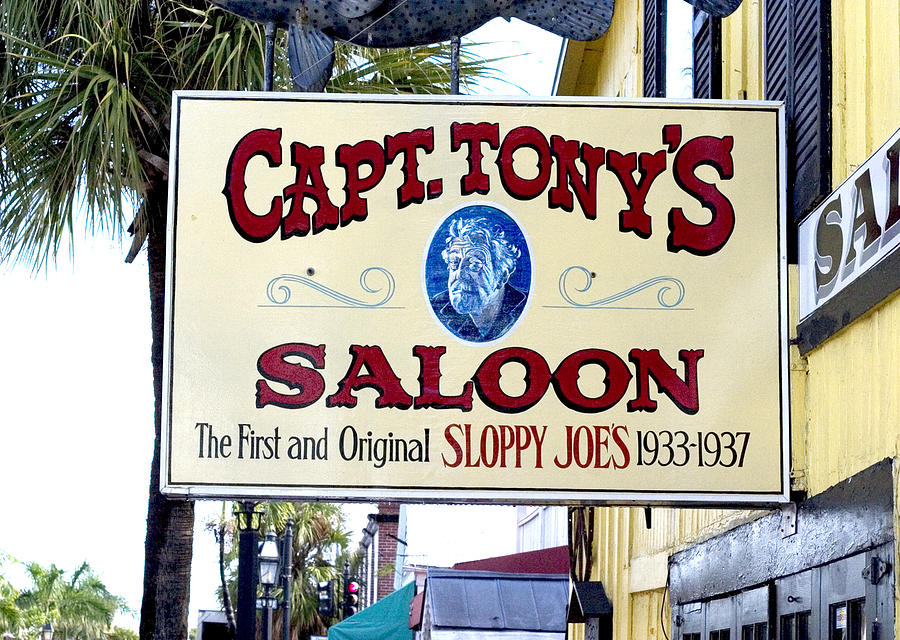 Beer Photograph - Sign at Captain Tonys Saloon by Carl Purcell