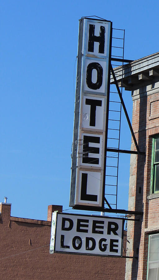 Sign Hotel in Deer Lodge Photograph by Cathy Anderson