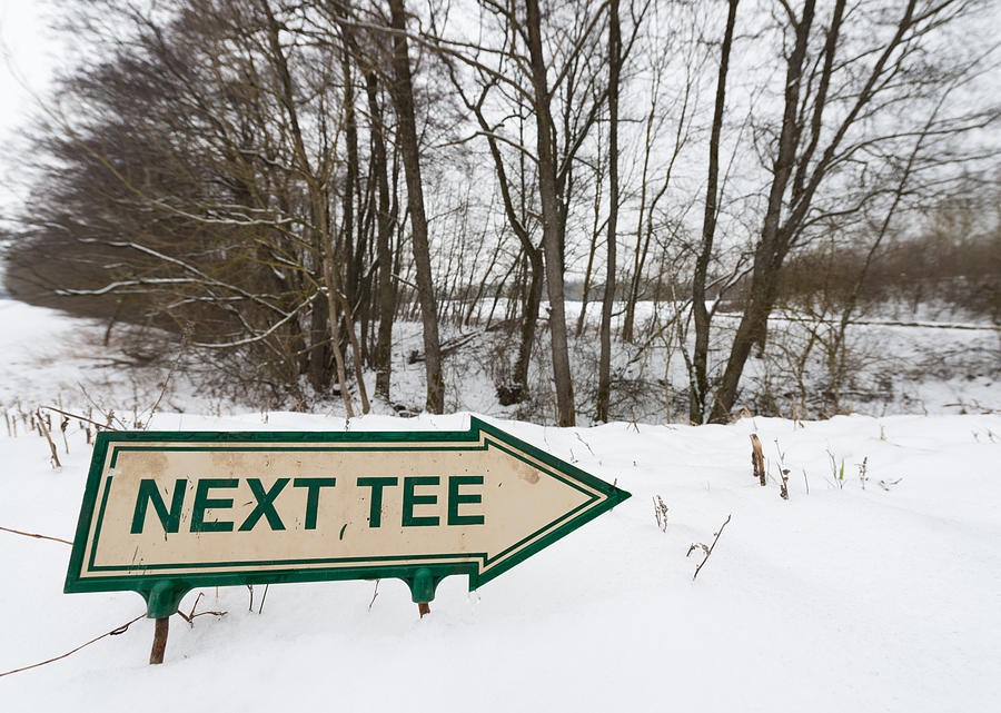 Sign next tee on golf course in winter Photograph by Matthias Hauser
