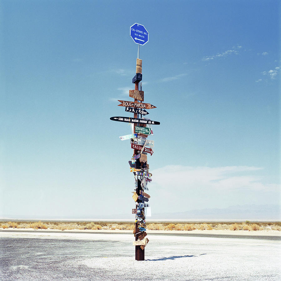 Sign Post In The Desert Photograph by Gary Yeowell