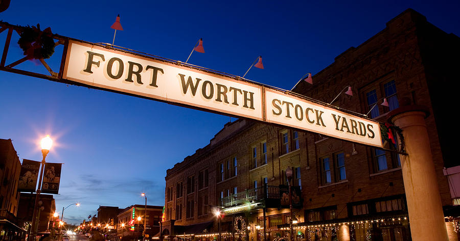 Fort Worth Photograph - Signboard Over A Road At Dusk, Fort by Panoramic Images
