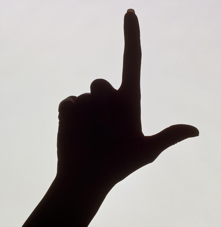 Silhouette Of A Hand With Index Finger Pointing Photograph by Phil Jude/science Photo Library
